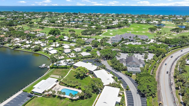 2 Church Ln Unit 115, North Palm Beach, FL 33408 - aerial view of property's location featuring a nearby body of water, nearby suburban area, and a golf course