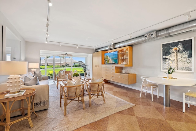 2 Church Ln Unit 115, North Palm Beach, FL 33408 - dining room with track lighting and light flooring