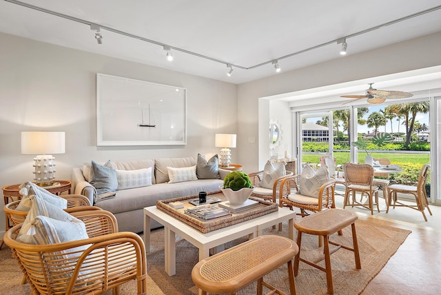 2 Church Ln Unit 115, North Palm Beach, FL 33408 - living room featuring rail lighting and ceiling fan