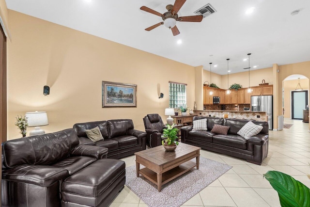 4086 Woodhill Pl, Boynton Beach, FL 33436 - living room with a ceiling fan, light tile patterned floors, arched walkways, and recessed lighting