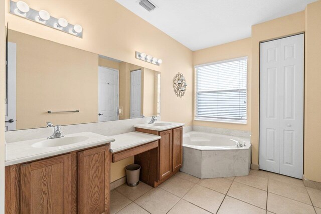 4086 Woodhill Pl, Boynton Beach, FL 33436 - bathroom featuring a bath, vanity, tile patterned floors, and a closet