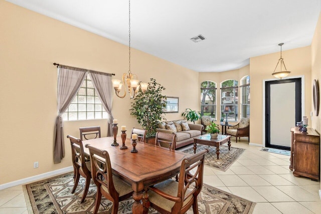 4086 Woodhill Pl, Boynton Beach, FL 33436 - dining space featuring a chandelier and light tile patterned floors