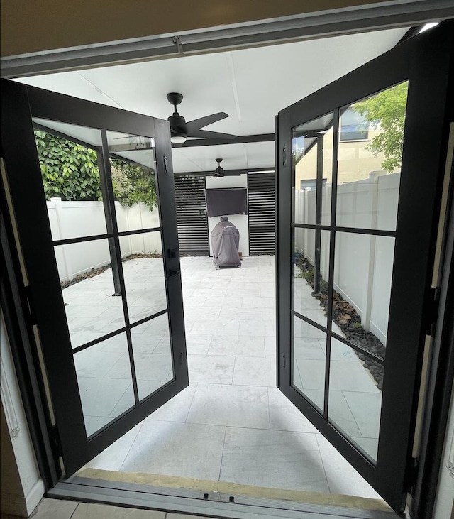 10606 W 33rd Ct, Hialeah, FL 33018 - doorway to outside featuring ceiling fan