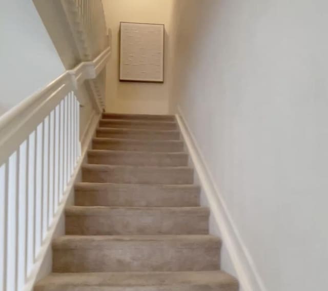 10606 W 33rd Ct, Hialeah, FL 33018 - staircase featuring wood finished floors