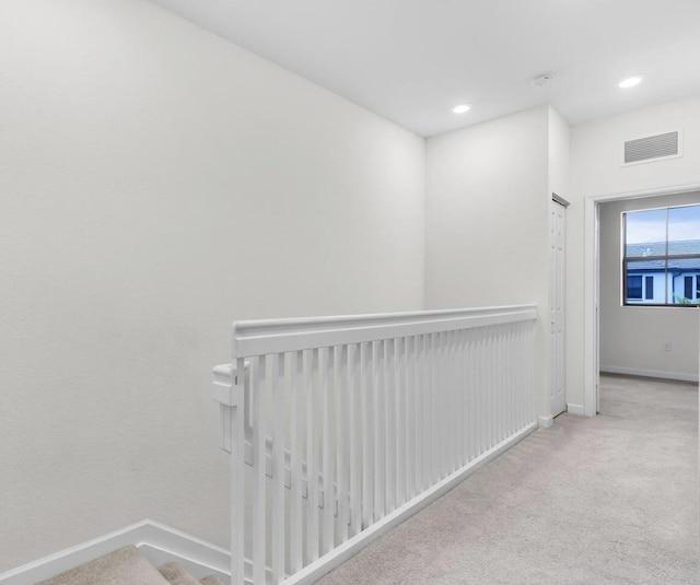 10606 W 33rd Ct, Hialeah, FL 33018 - hall featuring carpet flooring, recessed lighting, and an upstairs landing