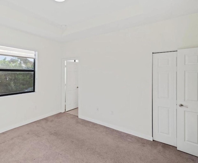 10606 W 33rd Ct, Hialeah, FL 33018 - carpeted empty room featuring baseboards
