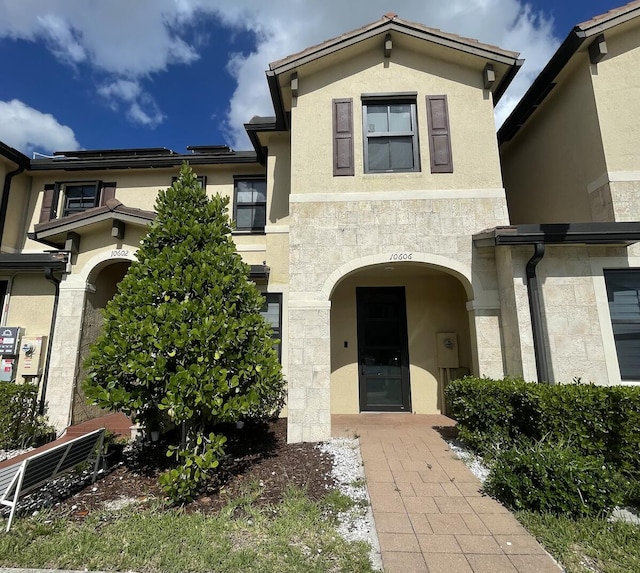 10606 W 33rd Ct, Hialeah, FL 33018 - view of front facade with stucco siding and stone siding