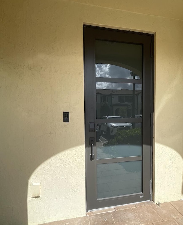 10606 W 33rd Ct, Hialeah, FL 33018 - entrance to property featuring stucco siding