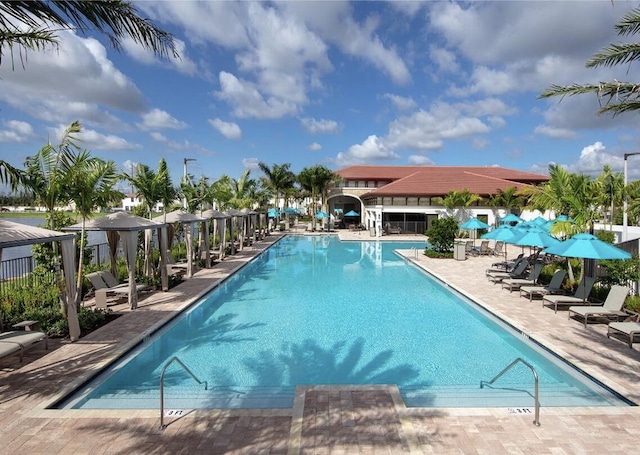 10606 W 33rd Ct, Hialeah, FL 33018 - community pool with a gazebo and a patio