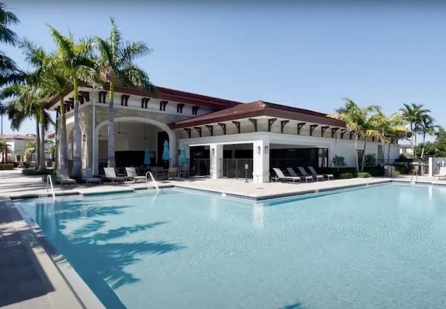 10606 W 33rd Ct, Hialeah, FL 33018 - community pool featuring a patio area