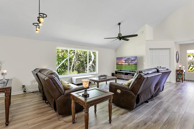 207 Jupiter Woods Dr, Jupiter, FL 33458 - living area featuring ceiling fan, light wood-type flooring, and high vaulted ceiling