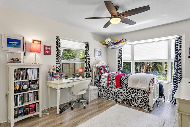 207 Jupiter Woods Dr, Jupiter, FL 33458 - bedroom with wood finished floors and a ceiling fan
