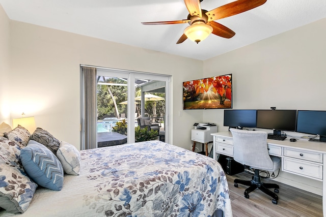 207 Jupiter Woods Dr, Jupiter, FL 33458 - bedroom featuring access to outside, an office area, wood finished floors, and ceiling fan