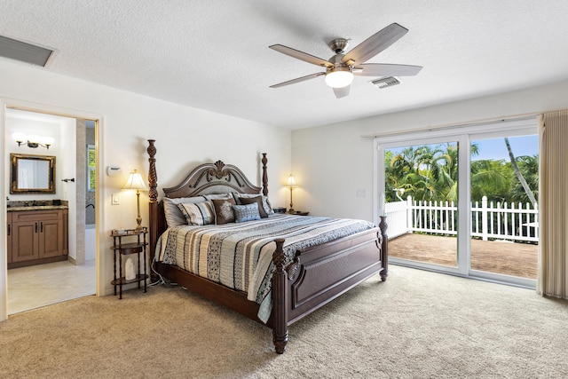 207 Jupiter Woods Dr, Jupiter, FL 33458 - bedroom featuring light carpet, access to outside, ensuite bath, a textured ceiling, and a ceiling fan