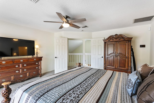 207 Jupiter Woods Dr, Jupiter, FL 33458 - bedroom with carpet, a textured ceiling, and a ceiling fan