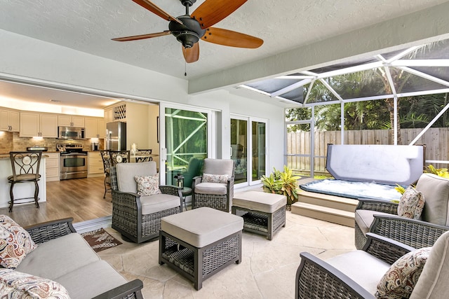 207 Jupiter Woods Dr, Jupiter, FL 33458 - sunroom / solarium with ceiling fan and outdoor lounge area