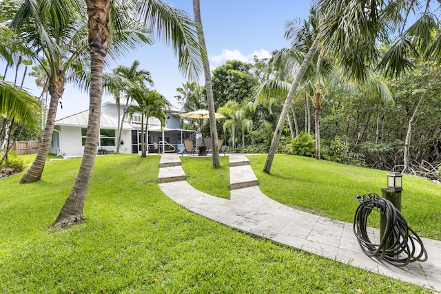 207 Jupiter Woods Dr, Jupiter, FL 33458 - view of property's community with a lawn