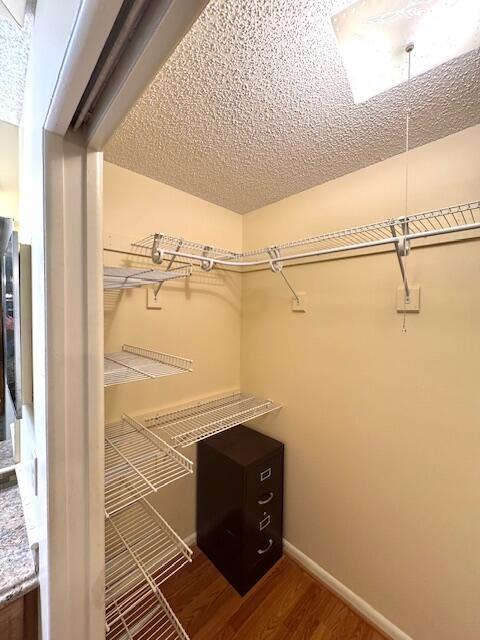 1023 Pheasant Run Dr Unit A, Fort Pierce, FL 34982 - spacious closet with wood finished floors