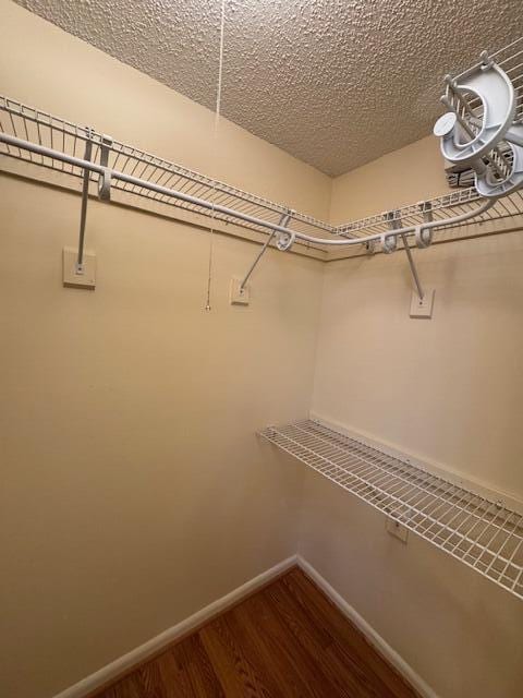 1023 Pheasant Run Dr Unit A, Fort Pierce, FL 34982 - spacious closet with wood finished floors
