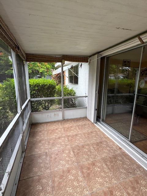 1023 Pheasant Run Dr Unit A, Fort Pierce, FL 34982 - view of unfurnished sunroom