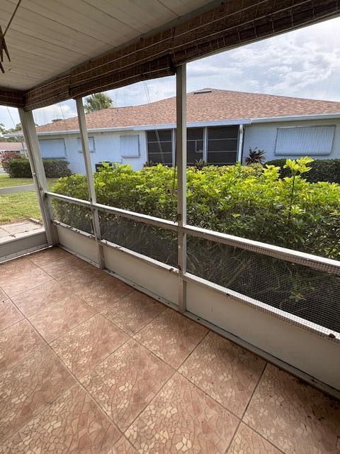 1023 Pheasant Run Dr Unit A, Fort Pierce, FL 34982 - view of unfurnished sunroom