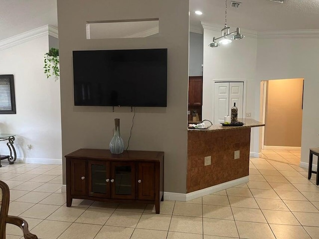 3718 SW Masilunas St, Port Saint Lucie, FL 34953 - living area featuring ornamental molding, light tile patterned floors, and a high ceiling