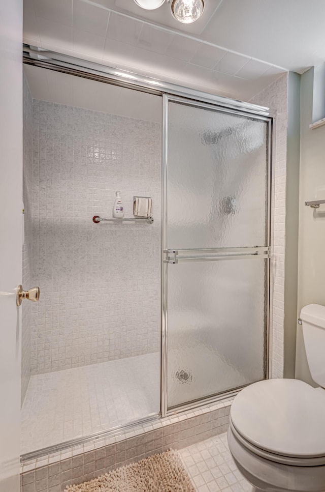 5390 Woodland Lakes Dr Unit 305, Palm Beach Gardens, FL 33418 - full bath with a shower stall and tile patterned flooring