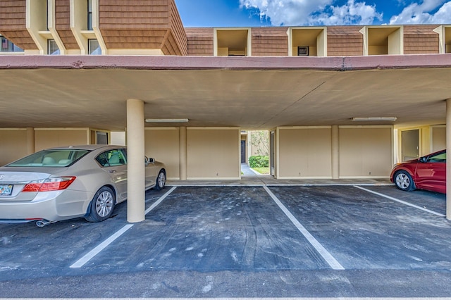 5390 Woodland Lakes Dr Unit 305, Palm Beach Gardens, FL 33418 - view of covered parking lot