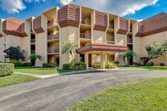 5390 Woodland Lakes Dr Unit 305, Palm Beach Gardens, FL 33418 - view of apartment building / complex
