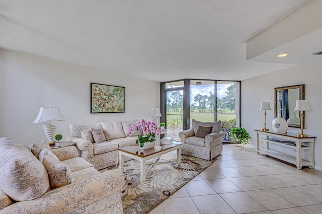 5390 Woodland Lakes Dr Unit 305, Palm Beach Gardens, FL 33418 - living area with expansive windows and light tile patterned floors