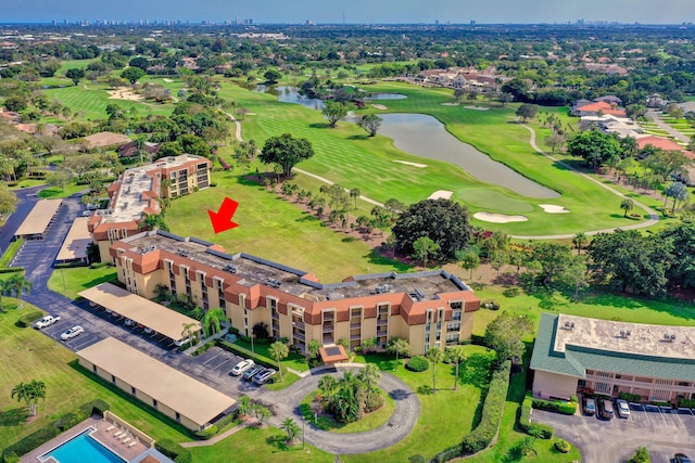 5390 Woodland Lakes Dr Unit 305, Palm Beach Gardens, FL 33418 - bird's eye view of a large body of water and a golf club