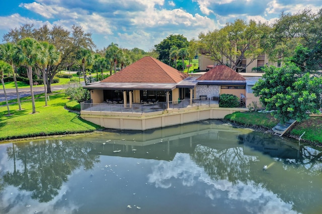 5390 Woodland Lakes Dr Unit 305, Palm Beach Gardens, FL 33418 - view of pool with a yard and a water view