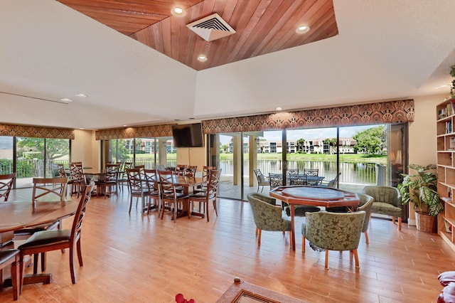 5390 Woodland Lakes Dr Unit 305, Palm Beach Gardens, FL 33418 - dining space featuring light wood-type flooring and recessed lighting