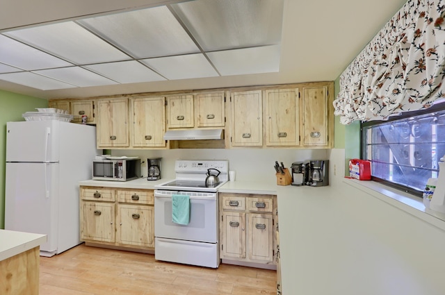 5390 Woodland Lakes Dr Unit 305, Palm Beach Gardens, FL 33418 - kitchen with white appliances, under cabinet range hood, and light countertops