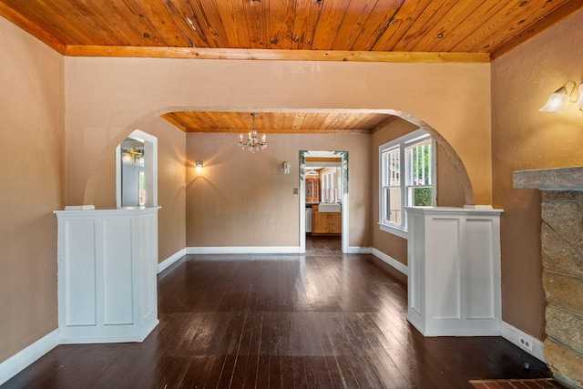909 N L St, Lake Worth Beach, FL 33460 - hall with wooden ceiling, hardwood / wood-style floors, a chandelier, and arched walkways