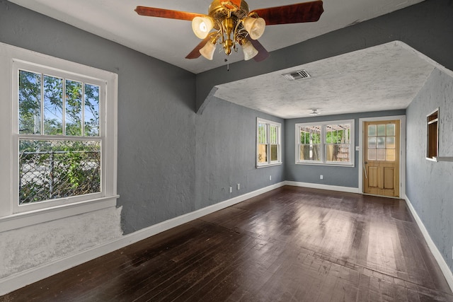 909 N L St, Lake Worth Beach, FL 33460 - unfurnished room with hardwood / wood-style flooring, ceiling fan, and a textured wall