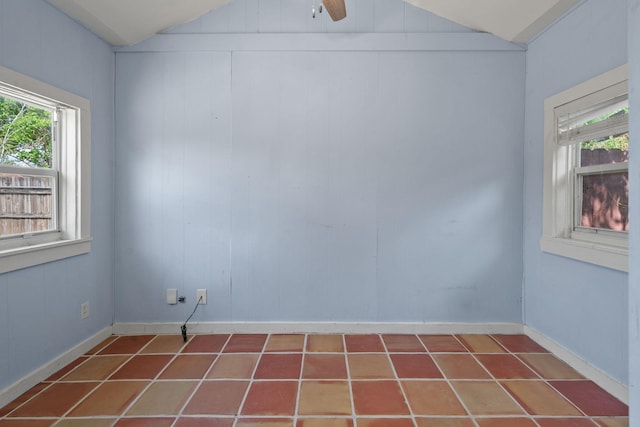 909 N L St, Lake Worth Beach, FL 33460 - unfurnished room with vaulted ceiling and a ceiling fan