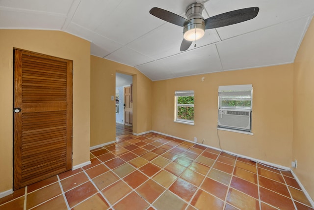 909 N L St, Lake Worth Beach, FL 33460 - tiled spare room featuring vaulted ceiling, cooling unit, and ceiling fan