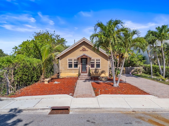 909 N L St, Lake Worth Beach, FL 33460 - view of front of house featuring decorative driveway