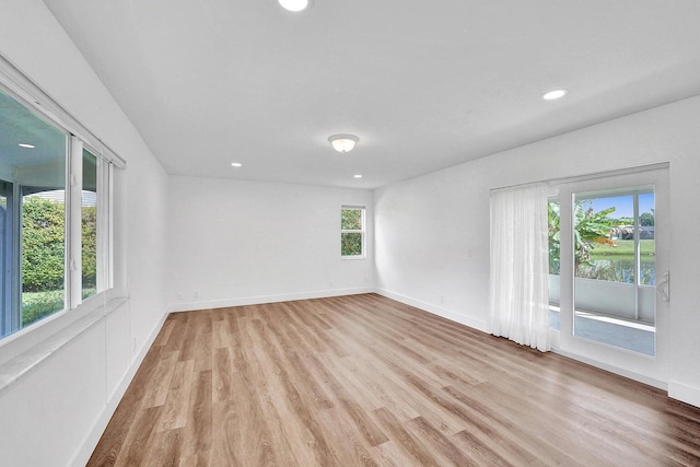 4110 NW 10th St, Delray Beach, FL 33445 - unfurnished room with plenty of natural light, light wood-style floors, and recessed lighting