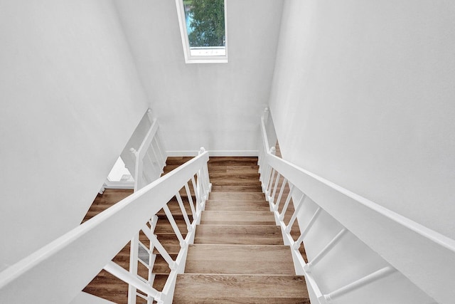 4110 NW 10th St, Delray Beach, FL 33445 - stairs with wood finished floors and a skylight