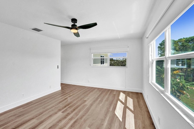 4110 NW 10th St, Delray Beach, FL 33445 - spare room featuring plenty of natural light, light wood-style floors, and a ceiling fan