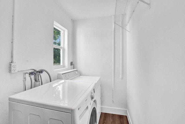 4110 NW 10th St, Delray Beach, FL 33445 - laundry room featuring separate washer and dryer and dark wood-style flooring