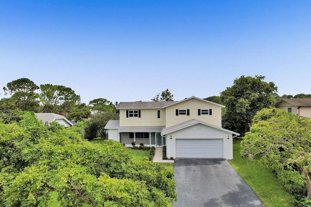 4110 NW 10th St, Delray Beach, FL 33445 - traditional-style home featuring asphalt driveway and stucco siding