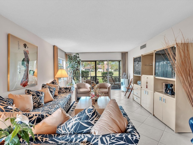 5869 Sugar Palm A Ct Unit A, Delray Beach, FL 33484 - living room with light tile patterned flooring and a textured ceiling