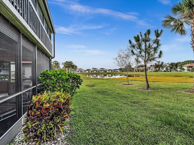 5869 Sugar Palm A Ct Unit A, Delray Beach, FL 33484 - view of grassy yard with a water view