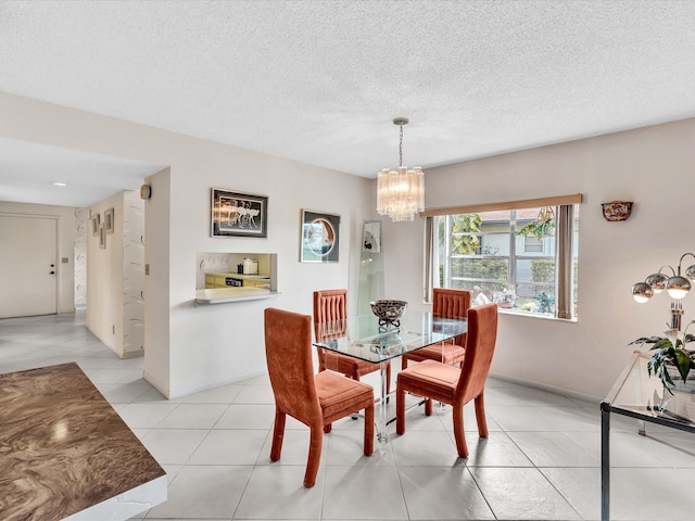 5869 Sugar Palm A Ct Unit A, Delray Beach, FL 33484 - dining room with a chandelier, light tile patterned floors, and a textured ceiling