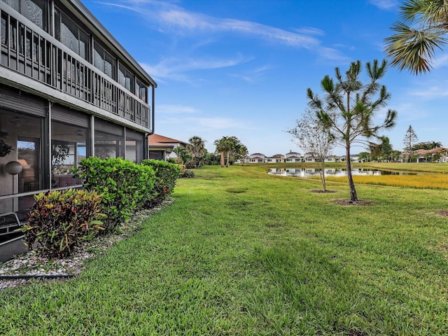 5869 Sugar Palm A Ct Unit A, Delray Beach, FL 33484 - view of grassy yard featuring a water view