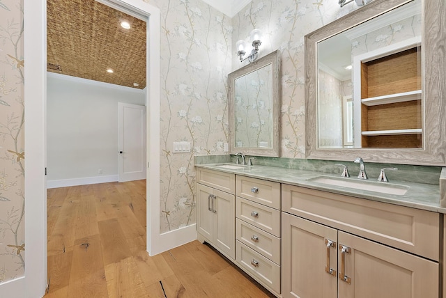 104 Hillcrest Dr, Sewalls Point, FL 34996 - full bath featuring wallpapered walls, wood finished floors, and double vanity