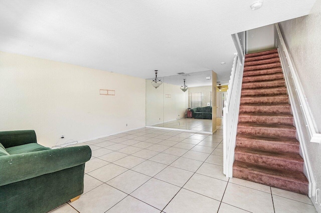 841 Summit Lake Dr, West Palm Beach, FL 33406 - living room with stairway and light tile patterned flooring